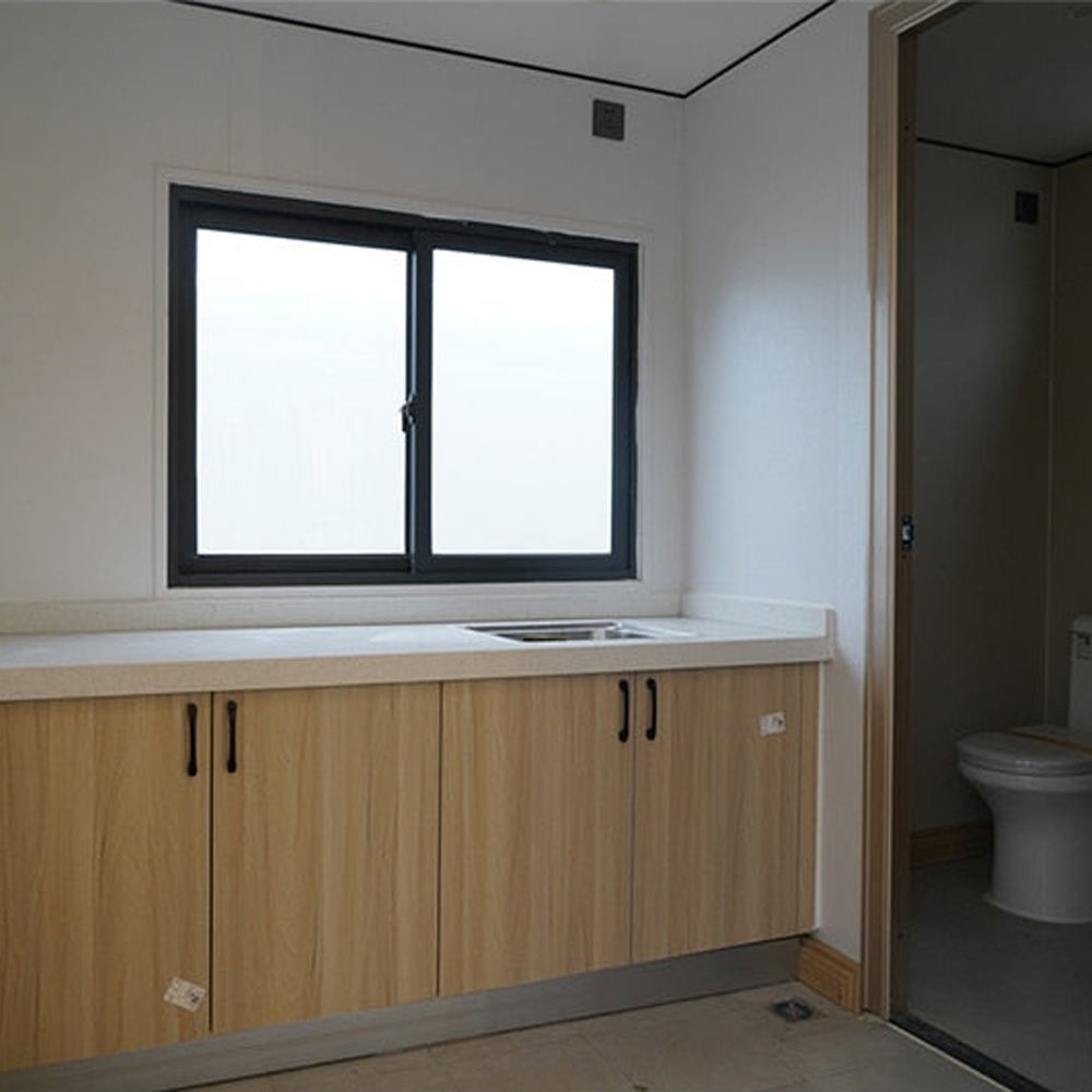 Customizable 20ft/40ft Folding Pack Container House: Complete with Bathroom, Kitchen, Covered Porch, and Double Wing Expansion Orange Compass