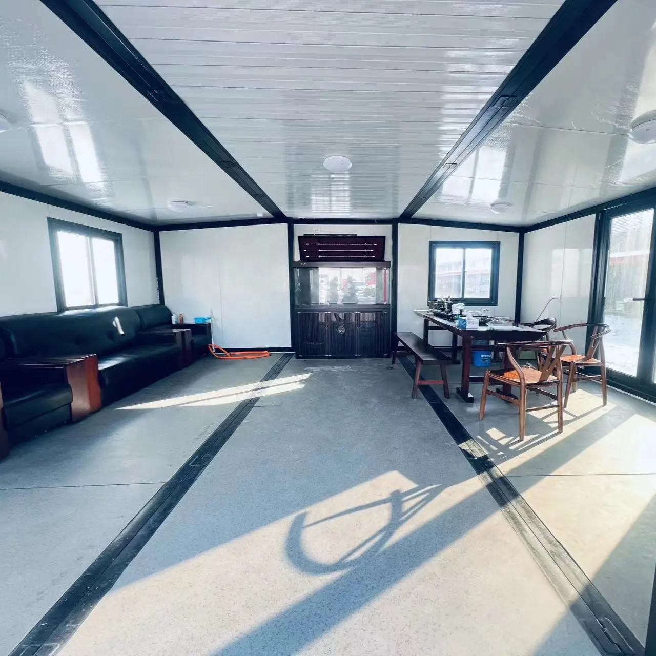 Customizable 20ft/40ft Folding Pack Container House: Complete with Bathroom, Kitchen, Covered Porch, and Double Wing Expansion Orange Compass