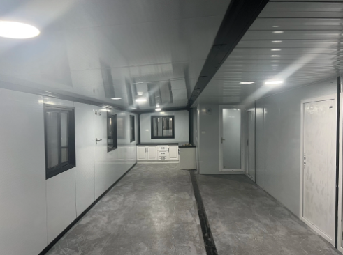 Customizable 20ft/40ft Folding Pack Container House: Complete with Bathroom, Kitchen, Covered Porch, and Double Wing Expansion Orange Compass