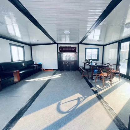 Customizable 20ft/40ft Folding Pack Container House: Complete with Bathroom, Kitchen, Covered Porch, and Double Wing Expansion Orange Compass